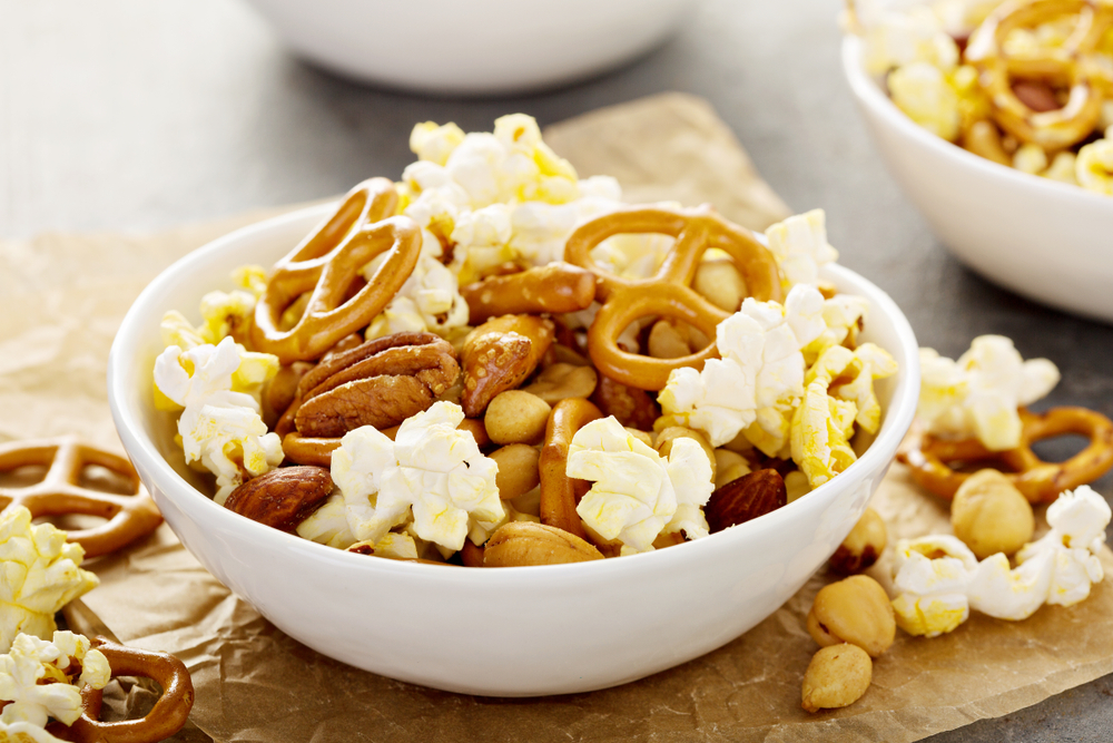 ©Elena Veselova Popcorn and pretzel trail mix healthy snack