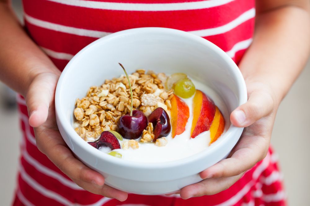 Healthy snack of yogurt with fruit and granola ©Anna_Pustynnikova