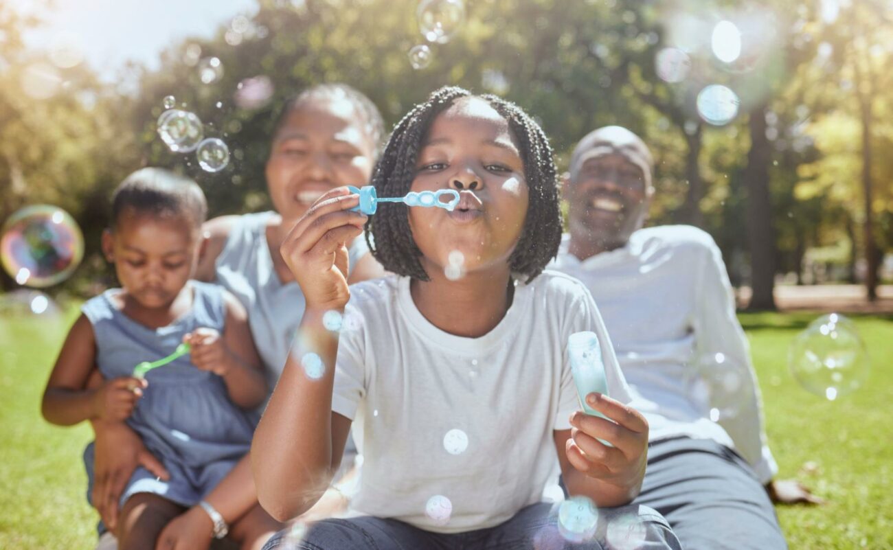 Family Blowing Bubbles ©PeopleImages.com - Yuri A