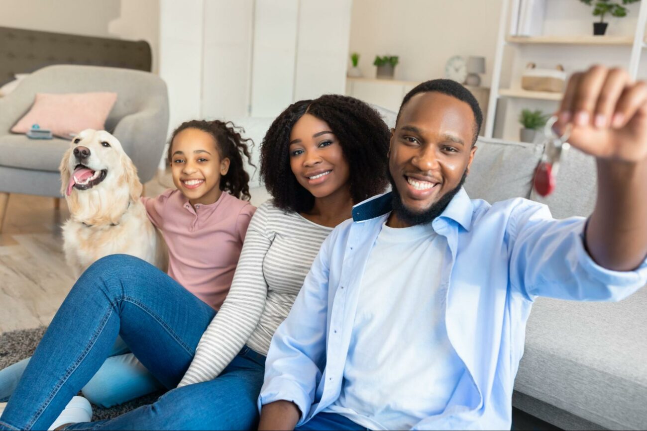 Happy Family Holding Keys to Their New House ©Prostock-studio