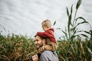 Son and Dad walking though a corn maze
©Megan Betteridge

