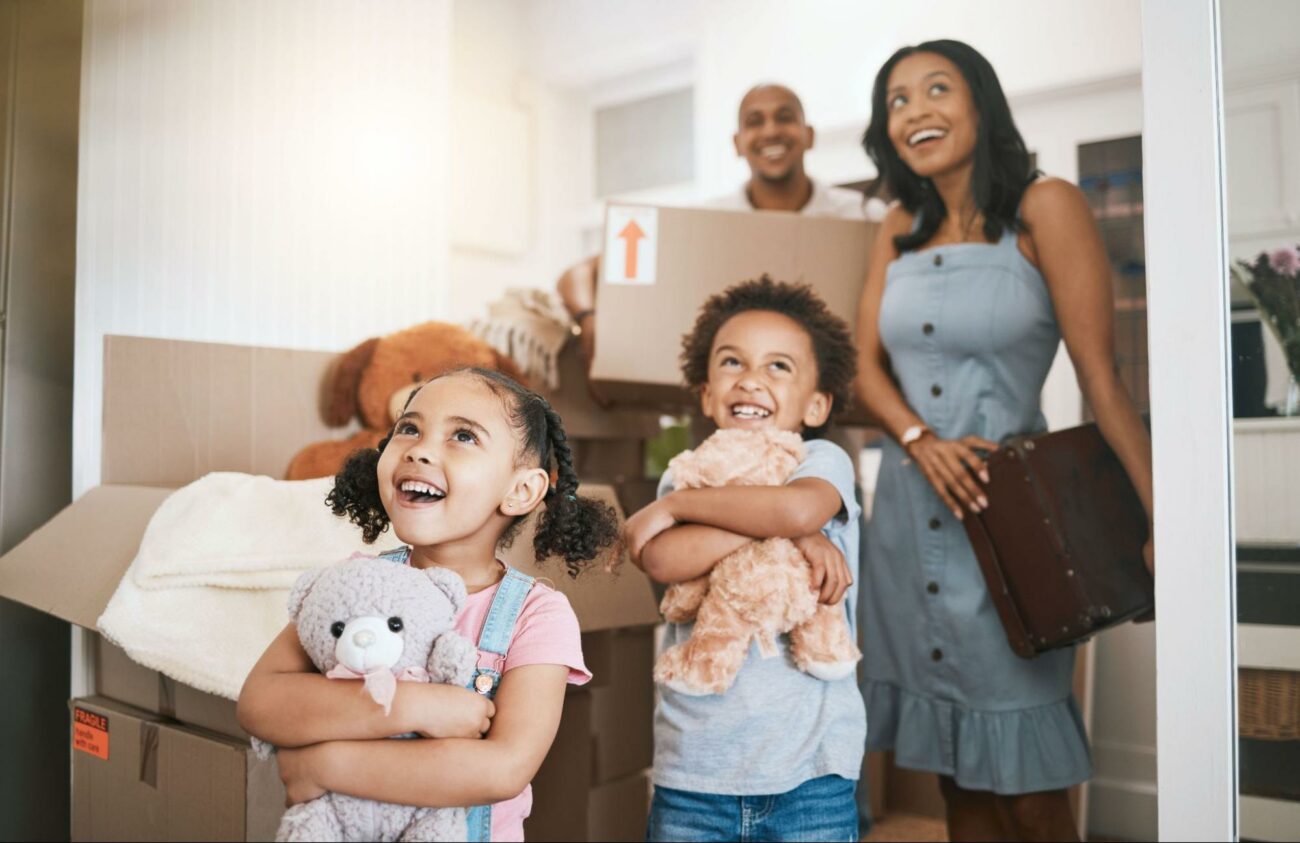 Mom, Dad, Son, & Daughter moving into a new home ©PeopleImages.com - Yuri A